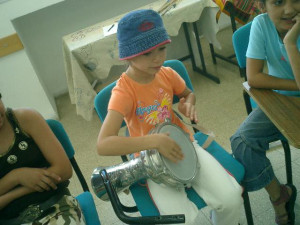 little girl plays darbuka